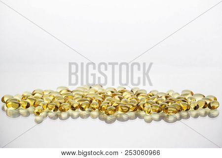 Fish Oil Supplement Capsules Isolated On White Background