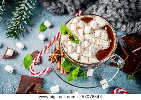 Homemade Hot Chocolate With Mint, Candy Cane And Marshmallow, Light Blue Background With Warm Blanke