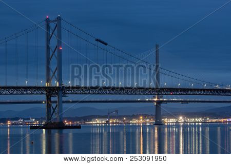 Road Bridges Over Firth Of Forth Near Queensferry In Scotland