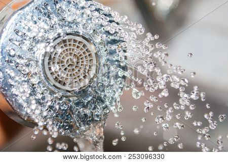Close Up Water Flowing Out From Sink Shower In Kitchen