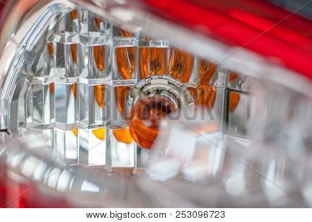 Broken Left Rear Signal Light Of Car, Focused On Reflector Of Yellow Light Bulb, Need To Call Insura