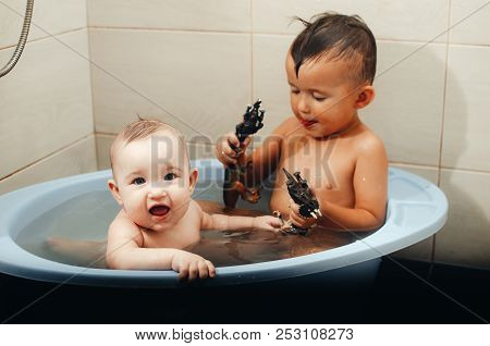 Children, Brother And Sister In The Bathroom