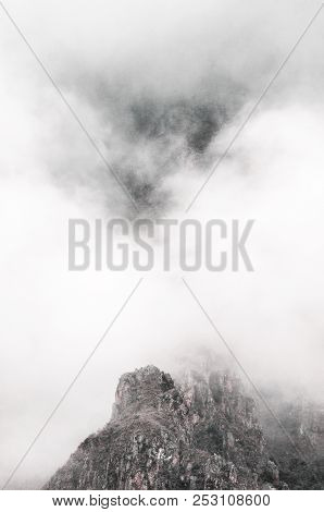 Mountains Can Be Seen From Behind The Clouds