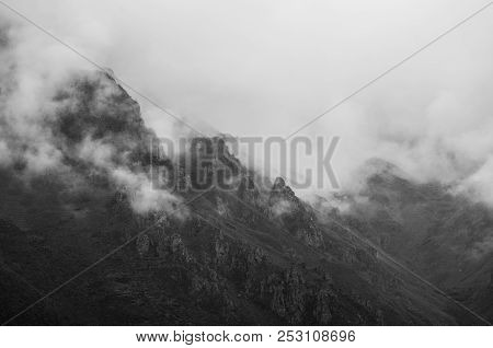 Mountains Can Be Seen From Behind The Clouds