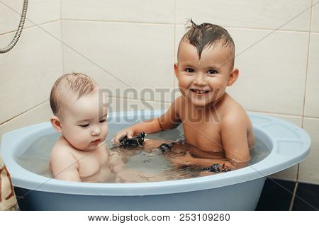 Children, Brother And Sister In The Bathroom