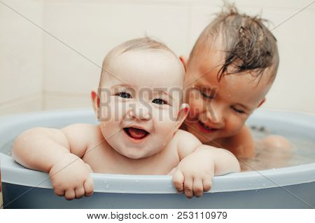 Children, Brother And Sister In The Bathroom