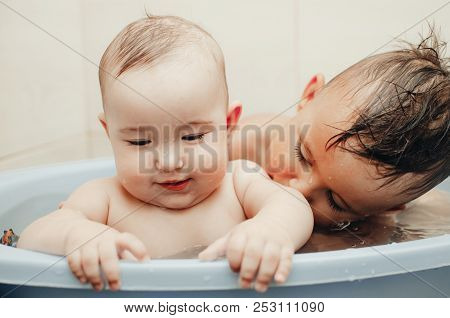 Children, Brother And Sister In The Bathroom