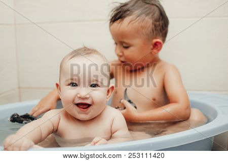Children, Brother And Sister In The Bathroom