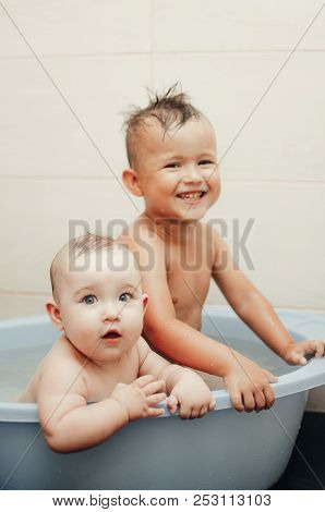 Children, Brother And Sister In The Bathroom