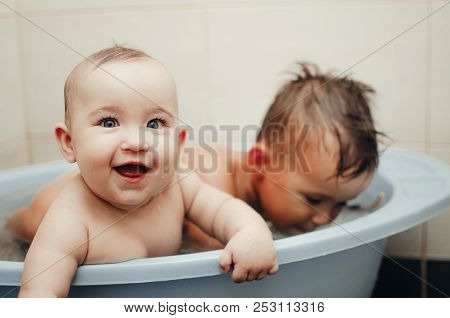 Children, Brother And Sister In The Bathroom
