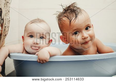 Children, Brother And Sister In The Bathroom