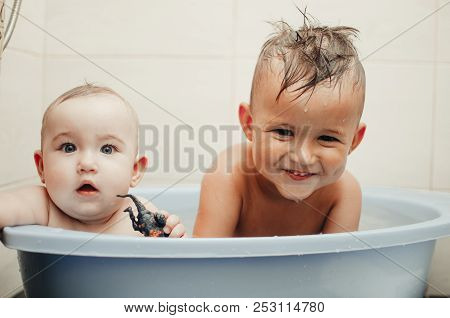Children, Brother And Sister In The Bathroom