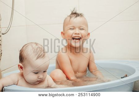 Children, Brother And Sister In The Bathroom