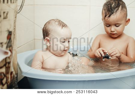 Children, Brother And Sister In The Bathroom