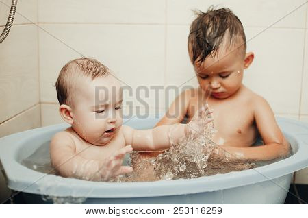 Children, Brother And Sister In The Bathroom
