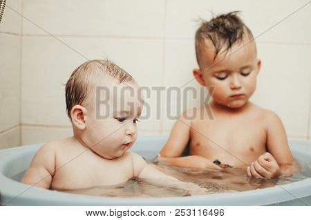 Children, Brother And Sister In The Bathroom
