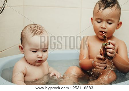 Children, Brother And Sister In The Bathroom