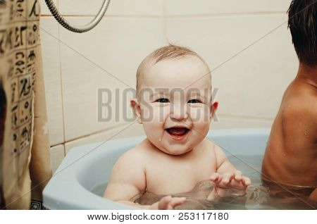Children, Brother And Sister In The Bathroom