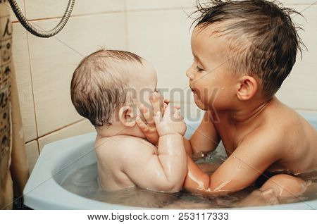 Children, Brother And Sister In The Bathroom