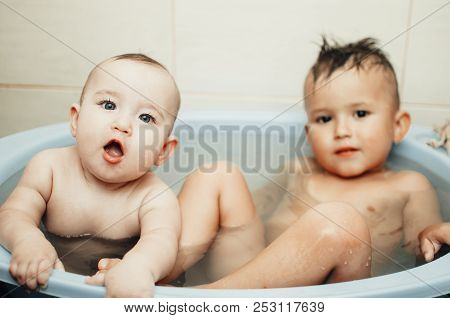 Children, Brother And Sister In The Bathroom