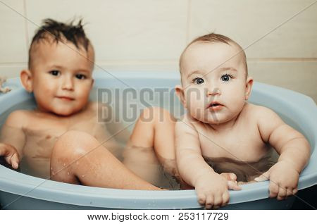 Children, Brother And Sister In The Bathroom