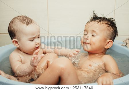 Children, Brother And Sister In The Bathroom