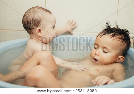 Children, Brother And Sister In The Bathroom