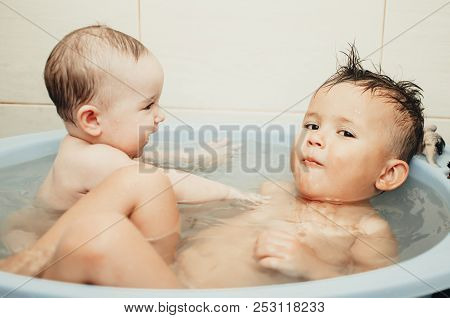 Children, Brother And Sister In The Bathroom