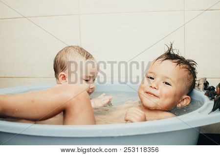 Children, Brother And Sister In The Bathroom