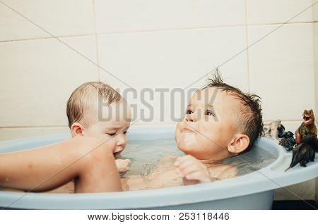 Children, Brother And Sister In The Bathroom