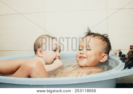 Children, Brother And Sister In The Bathroom