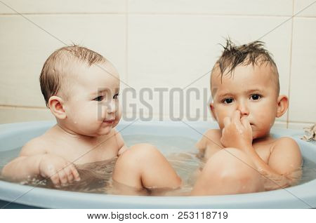Children, Brother And Sister In The Bathroom