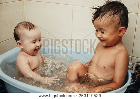 Children, Brother And Sister In The Bathroom