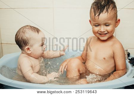 Children, Brother And Sister In The Bathroom