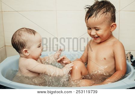 Children, Brother And Sister In The Bathroom
