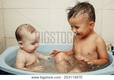 Children, Brother And Sister In The Bathroom