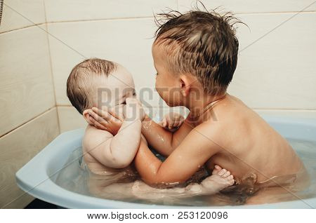 Children, Brother And Sister In The Bathroom