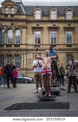 Edinburgh, Scotland  - August 7: Street Performer Spikey Will Flexing At The Edinburgh Fringe Festiv