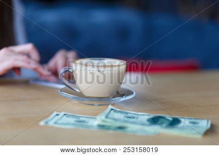 A Nice Girl With A Cup Of Cappuccino