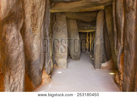 Trigueros, Spain - July 2nd, 2018: Dolmen De Soto Interior. Corridor From Entrance View, Trigueros, 