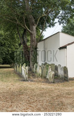 Beccles, Suffolk, Uk, July 2018 - Headstones Placed In A Corner Of Former Historic Kilbrack Cemetery