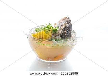 Vegetable Soup With Fish In A Glass Bowl