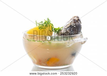 Vegetable Soup With Fish In A Glass Bowl