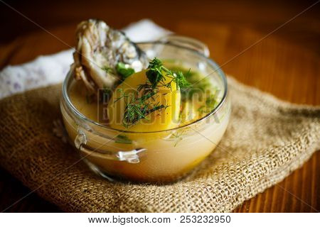 Vegetable Soup With Fish In A Glass Bowl