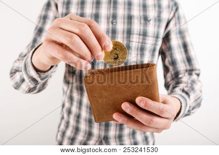 Businessman Holding Bitcoin. Golden Bitcoin Coin In Men Hands, Pened Wallet. Virtual Currency. Crypt