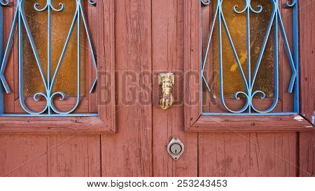 Vintage Wood Door Detail With Windows And Handles