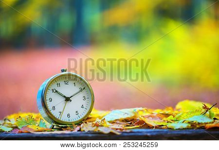 Time Concept. Clock Anounce Autumn
