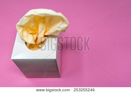 Facial Tissue Cube Box. Peach Colored Tissue Paper.