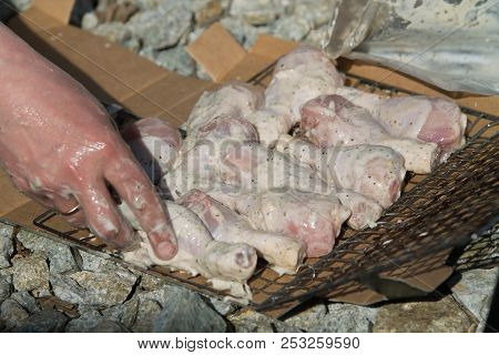 Raw Chicken Legs Prepared On A Wooden Board For Cooking