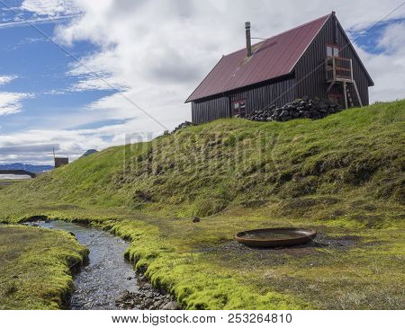Red Roof Wooden Mountain Hut Strutur Maelifellssandi Near Road F210 In Iceland Natue Reserve Fjallab